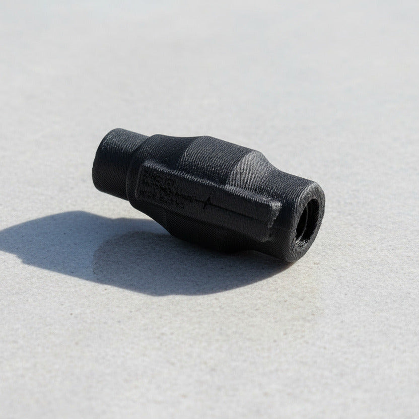 Black rubber Nozzle on a light gray background