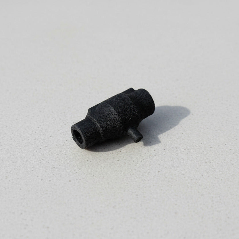Black rubber Nozzle on a light gray background